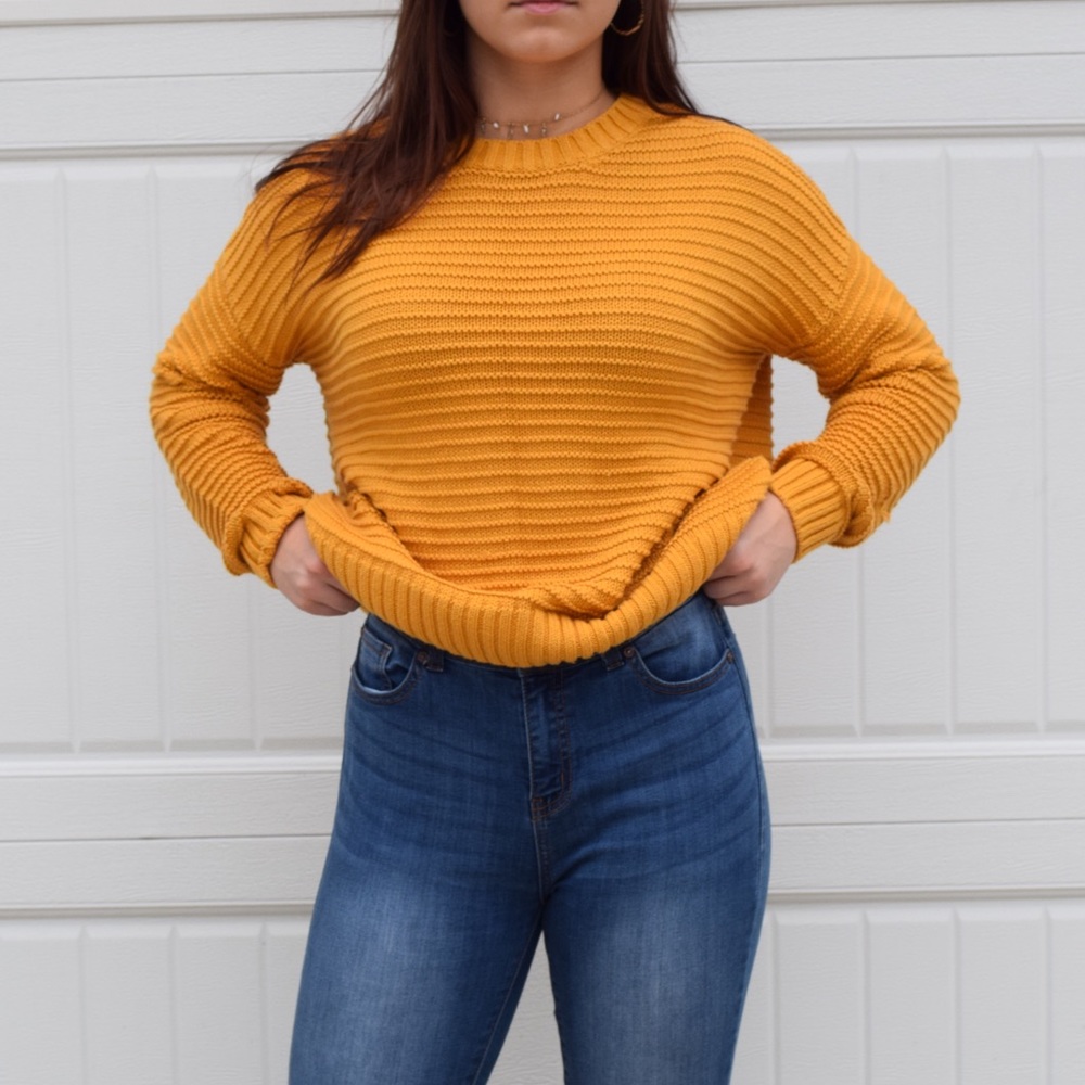 Divided knitted sweater